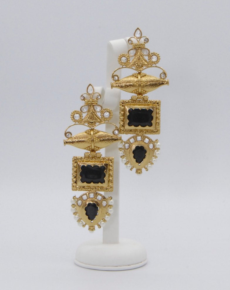 Quirky high gold earrings