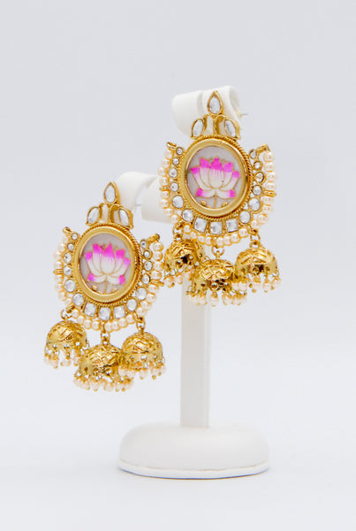 Triple chumkee w/ floral motif earrings.