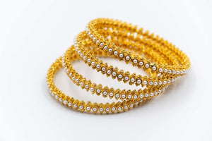 Gold bangles (pearl)